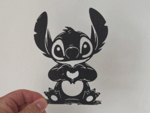 stitch heart wall art — textile heart wall decoration, hand-stitched texture close-up